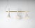 Pressed wood pendant light 3 by johannes hemann dimensions: d 20 x w 110 x h 33 cm. Materials: brass, ash. All our lamps...