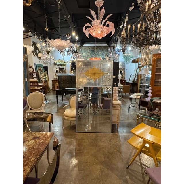 The Maison Jansen Design Eglomise’ Sunburst Trumeau Mirrors are elegant and stylish home décor pieces . These mirrors...