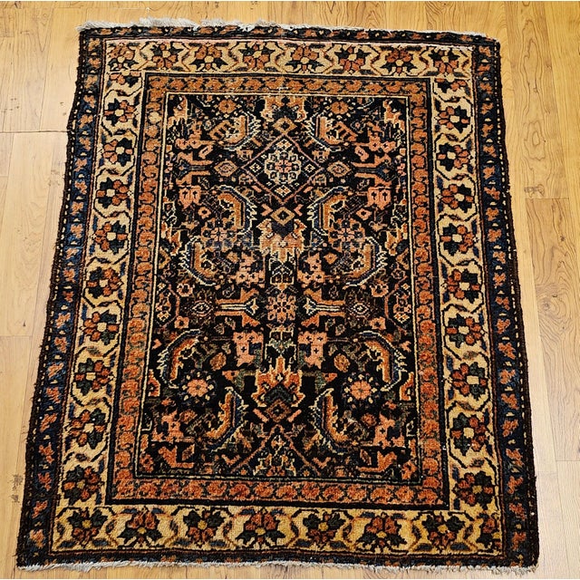 This exceptional early 20th century Persian Malayer rug features a highly desirable near-square format, making it an ideal...