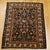 This exceptional early 20th century Persian Malayer rug features a highly desirable near-square format, making it an ideal...