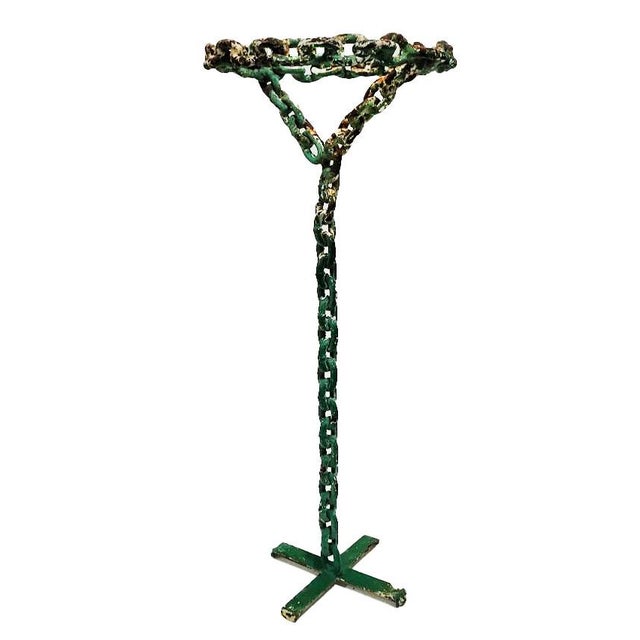 Inject a dose of raw, industrial edge into your space with this striking vintage mid-century Brutalist pedestal stand....