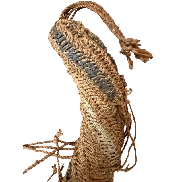 A pair of woven koteka from the Sepik Highlands of Papua New Guinea. Worn by men of select groups in the highland region,...