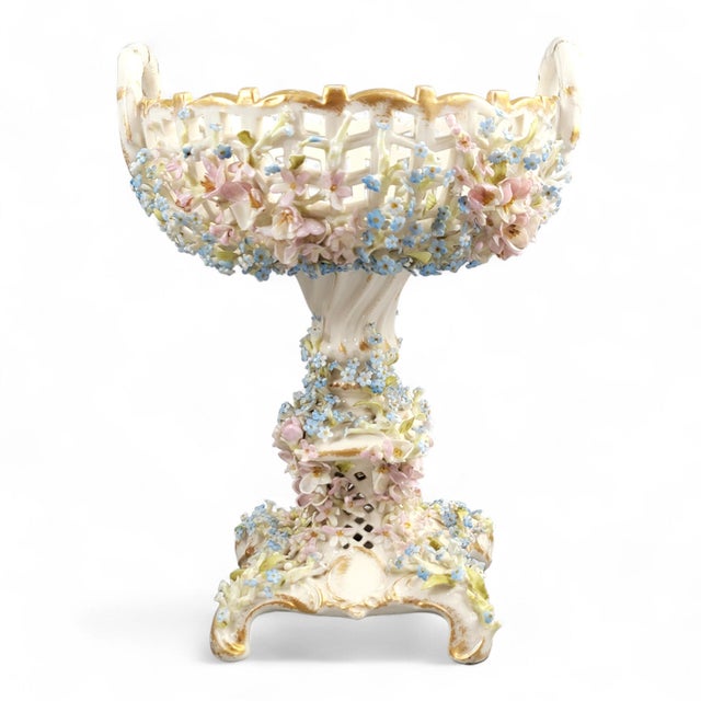 A large and highly decorative late-19th-century porcelain centerpiece by C.G. Schierholz & Sohn, Plaue an der Havel,...