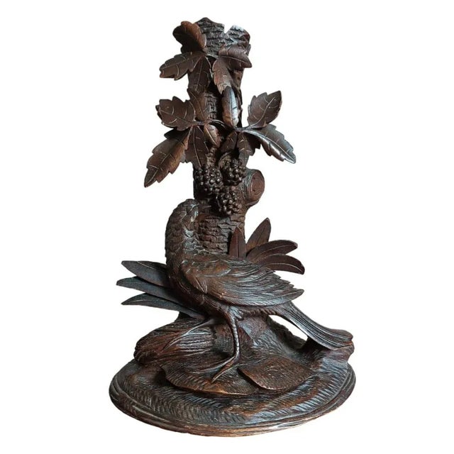 A pair of pheasant black forest vase Walnut wood, thinner carved, with a lot of floreal design from Brienz Switzerland