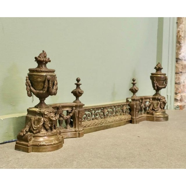 French Rococo Brass Extending Fender with Decorative Chenets This is a handsome piece, each end of the fender has an...