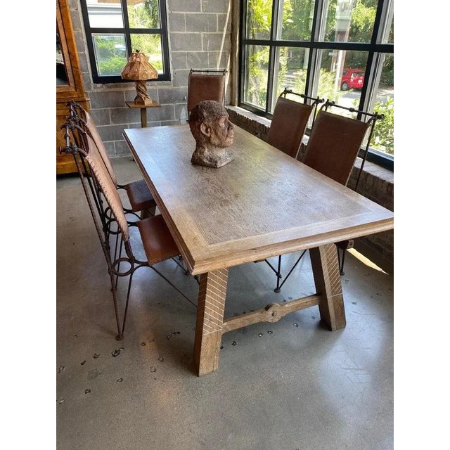 Set of four dining chairs in sought-after design by internationally recognized designer, Ilana Goor. Welded steel rebar...