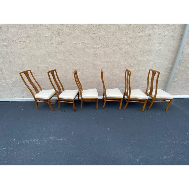 6 Elegant modern design chairs with silk blend seat covers. By buyers favorite Drexel furniture feel free to ask me...