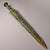 This is a cast bronze ceremonial dagger or short sword, featuring extensive gold inlay (gilt bronze) decoration. The blade...