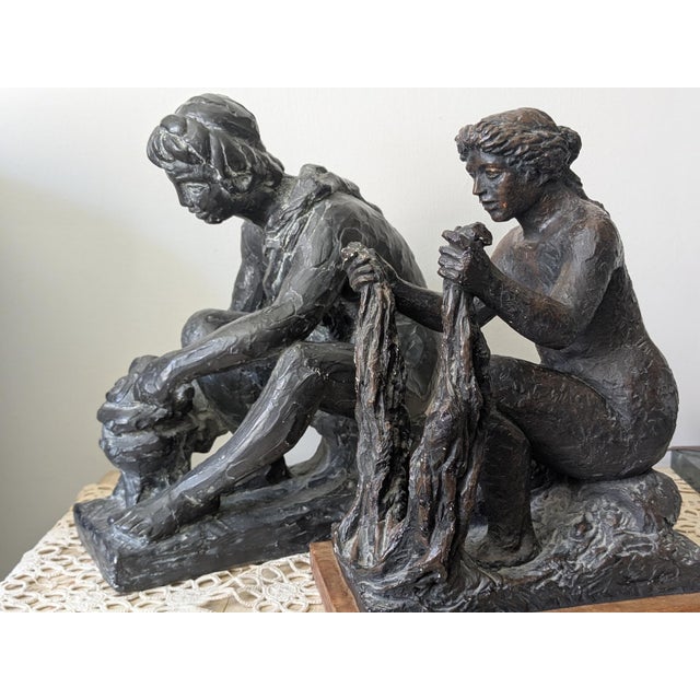 This pair of vintage sculptures is based on designs by Pierre Auguste Renoir (1841- 1919, in his later years, for a pair...