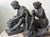 This pair of vintage sculptures is based on designs by Pierre Auguste Renoir (1841- 1919, in his later years, for a pair...