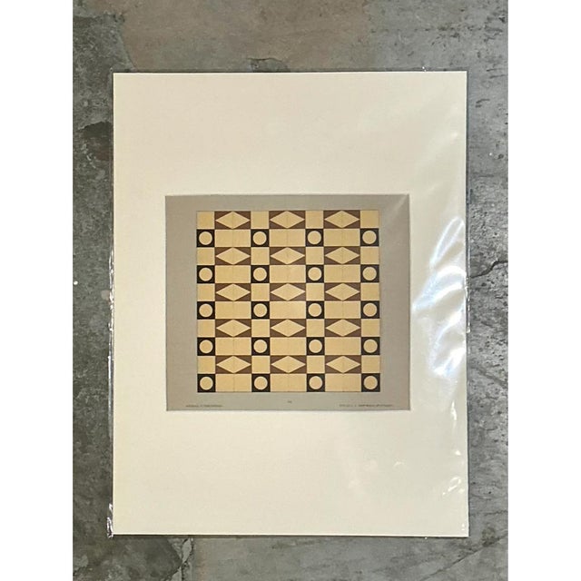 This striking Mid-Century Modern serigraph captures the meticulous geometry of a vintage floor tile design. Masterfully...