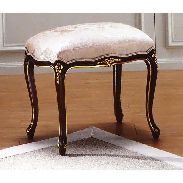 Handcrafted in Italy, this elegant Louis XV-style stool showcases graceful cabriole legs, a shaped apron, and delicate...