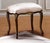 Handcrafted in Italy, this elegant Louis XV-style stool showcases graceful cabriole legs, a shaped apron, and delicate...