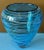 This beautiful Art Glass Vase was hand blown by renowned artisans in Seattle, Washington from blue glass. An applied...