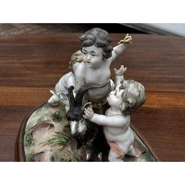 Porcelain Group of Nude Putti & the Goat Amalthea on Wooden Display Stand For Sale - Image 3 of 16