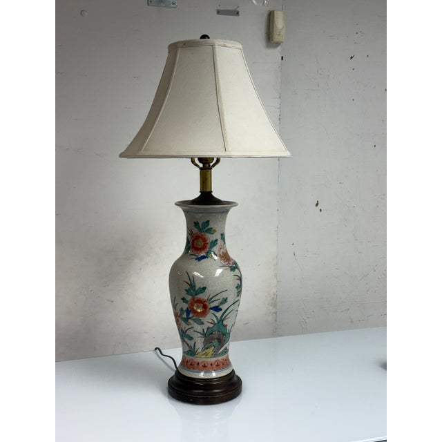 Design Plus Gallery presents an Aladin Lamps & Shades Floral Porcelain Table Lamp. The ceramic body has an elongated...