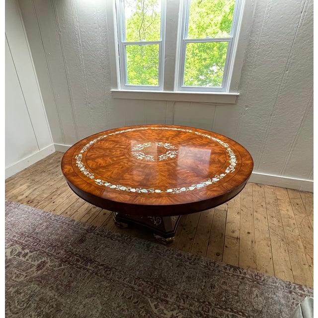 This extraordinary oversized round pedestal dining table is a masterpiece of high-end Italian craftsmanship by the...