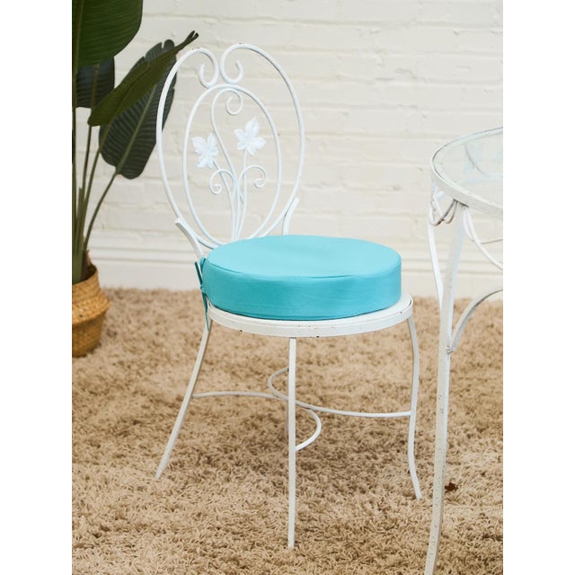 Modern Vintage Wrought Iron Patio Dining Table With Leaf Motif Aqua Cushions and Glass Top For Sale - Image 3 of 7