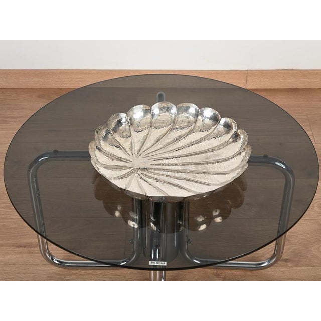 Fantastic large round shell shaped centerpiece completely handmade in hammered silver plate. This beautiful piece was...