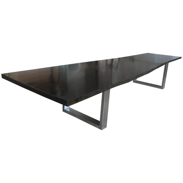 Impressive live edge dining table made from sycamore with a hand French polish finish and custom brushed stainless steel...