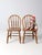 A charming pair of vintage Windsor children’s chairs by Union City Chair Co., crafted with classic curved hoop backs and...