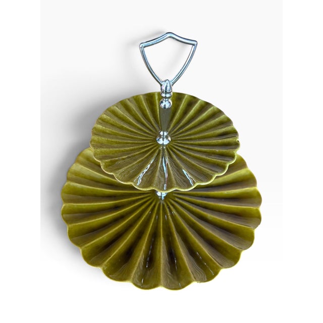 Striking vintage Maddux of California C603 two-tier serving stand dating to the mid-20th century, featuring sculptural...