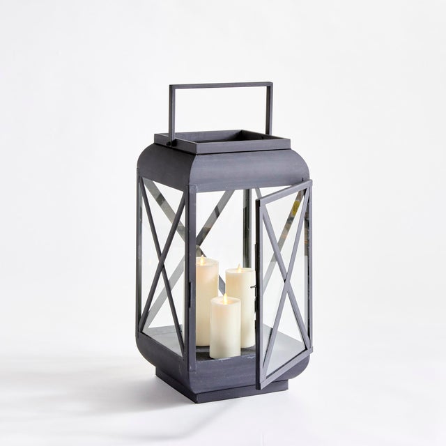 Although it has a traditional silhouette, this wellscaled outdoor lantern has a contemporary feel. With a look reminiscent...