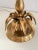 Unusual, chic little table lamp, made in Italy in the 70s. The lamp base is made of solid brass and has a ring of brass...