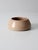 Vintage handmade studio pottery bowl showcasing a softly rounded low-profile form with a warm oatmeal glaze and...