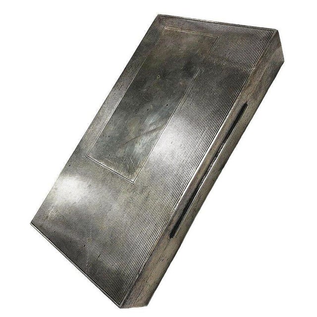 Art Deco sterling silver and mahogany cigar/trinket box by Dunhill Features a large unused monogram engraving area along...