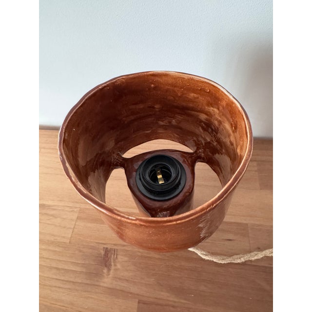 Handmade Ceramic Table Lamp Details: • Material: clay • Finish: Hand-applied textured glaze in brown, cooper tones •...