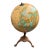 Cram's Imperial World Globe With Textured Mountain Ranges & Paw Footed Iron Base For Sale