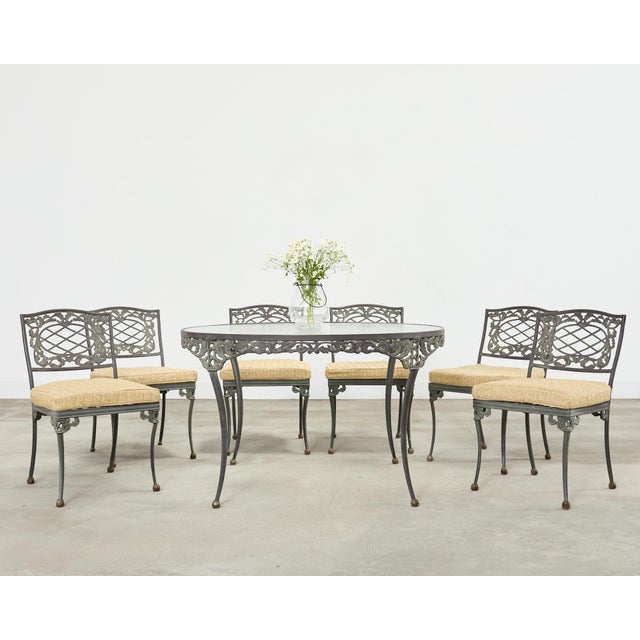 Genuine labeled Brown Jordan patio and garden dining suite consisting of six dining chairs (model #1210-1000), and a 48...