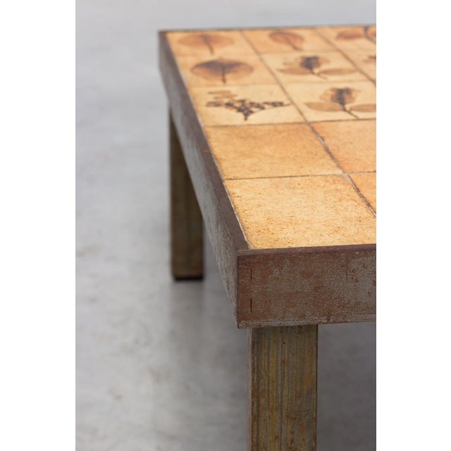 This rectangular coffee table was designed by Roger Capron in the 1970s as part of his Garrigue series. It features a...