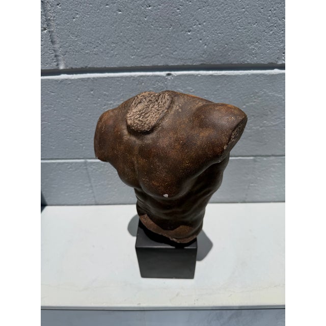 A cast plaster classical male torso sculpture designed by renowned artist Sergey Eylanbekov and produced by the celebrated...