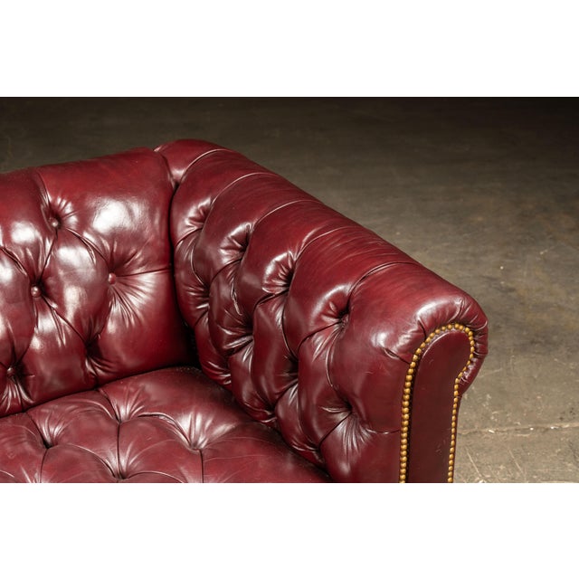 Wood Vintage Deep Red Leather Tufted Chesterfield Sofa With Brass Nailhead Trim For Sale - Image 7 of 9