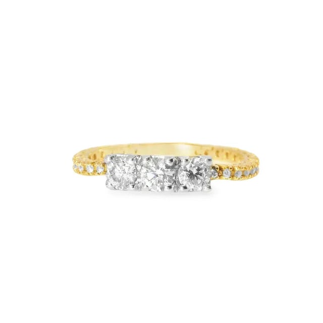 Enhance your collection with this stunning 18K Rose Gold Diamond Band. This elegant piece features 3 brilliant round...