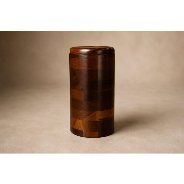 A striking example of Brazilian Modern craftsmanship, this sculptural wine holder was designed by Jean Dobré for Tropic...