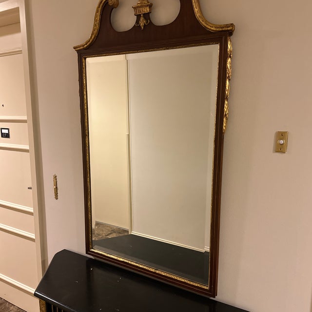 Reproduction of Chippendale style Mahogany Mirror in like-new condition. It graced a beautiful Charlottesville estate,...