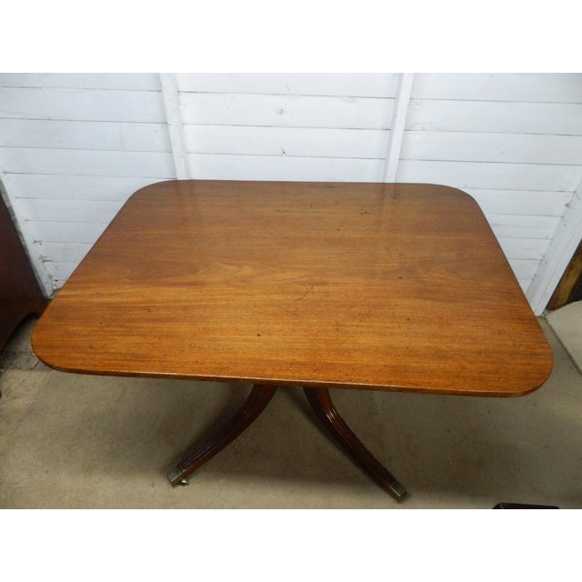 The Mahogany Tilt Top Lou Table is an elegant piece of Edwardian furniture, made from rich mahogany with a waxed finish....