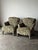 Wrapped edge to edge in a dense acanthus leaf tapestry, this pair of vintage club chairs carries real presence in a room....