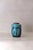 Crafted in Southern China between 1820 and 1890, the Vintage Emerald Green Pot brings a burst of heritage charm to your...