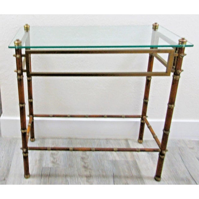 Mid-Century French Maison Baguès Glass Top Faux Bamboo Wood and Brass Side Table The legs and horizontal base supports are...