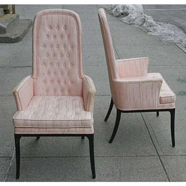 Elegant high back tufted armchair by Erwin-Lambeth. Original pale pink fabric with tufted back and seat cushion sit atop...