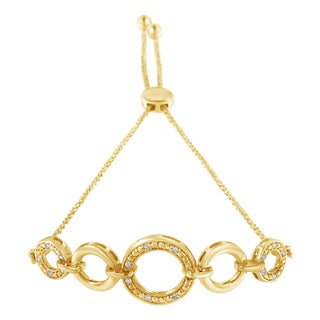10K Yellow Gold over .925 Sterling Silver Diamond Accented Graduated Infinity Open Circle 6”-9” Adjustable Bolo Bracelet (H-I Color, I2-I3 Clarity) For Sale