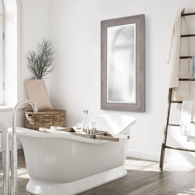The handsome faux wood grain pattern and beveled mirror gives the Ashford mirror a definite sophisticated modern style....