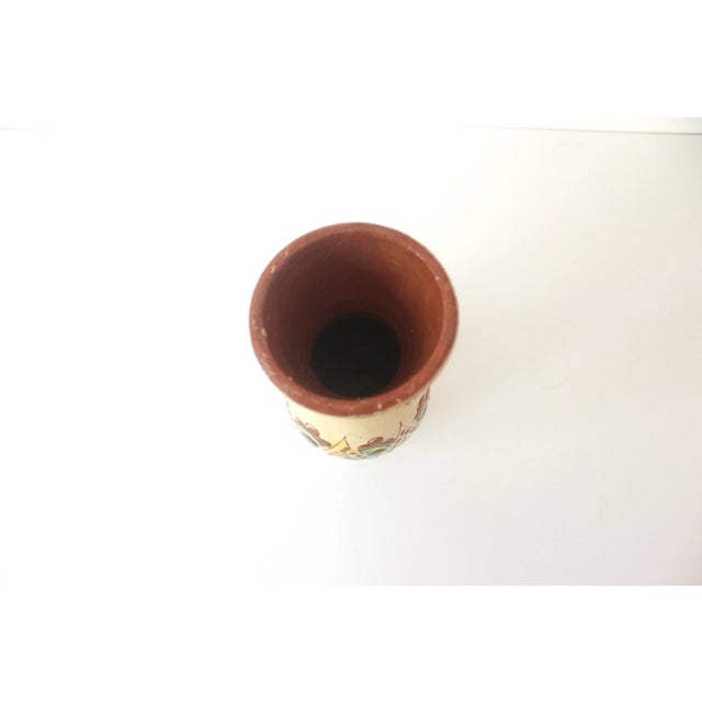 Gorgeous Boho terracotta vase with a very Bohemian pattern. The base colour is a creamy yellow, with brighter yellow,...
