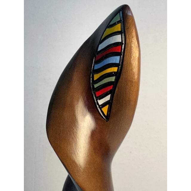 Make a bold artistic statement with this striking vintage Mid-Century Modern hand-carved wooden sculpture. Featuring an...