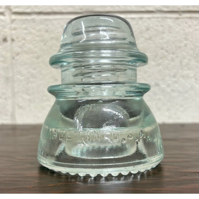 This is a gorgeous clear vintage glass Hemingray insulator. “Hemingray-42” with a teal tint to it. Several insulators in...