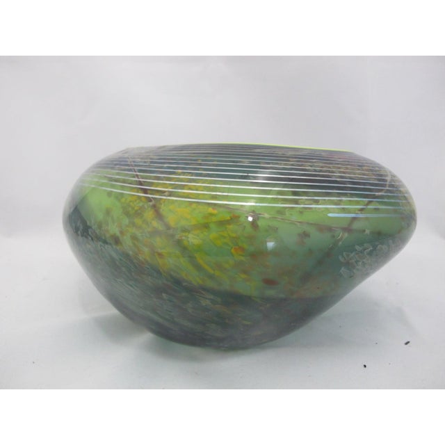 Suzanne Kindland, resident comtemporary artist at Icefire Glassworks in Cannon Beach, Oregon. Free form studio art glass...